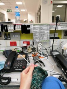 Emergency center desk with landlines and speed dials